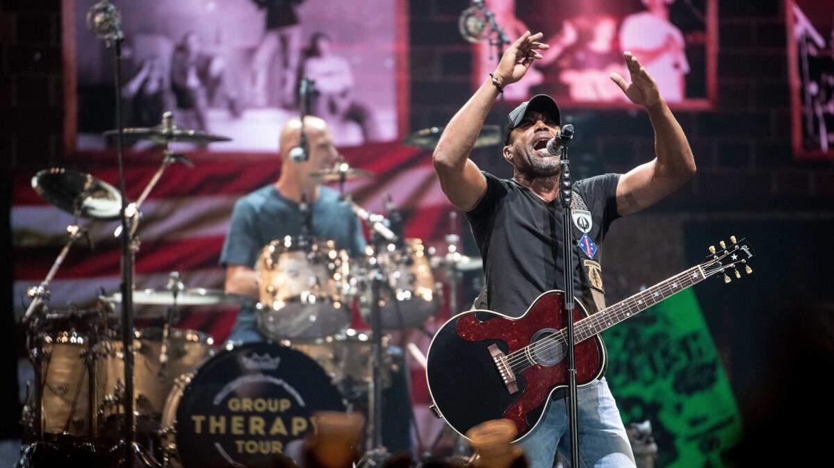 Darius Rucker and Jim Sonefeld perform with Hootie and the Blowfish during the first of three shows in their hometown during their “Group Therapy Tour” at Colonial Life Arena Wednesday, Sept. 11, 2019, in Columbia, S.C. The band, on hiatus since 2008, formed in 1986 while the members attended the University of South Carolina.