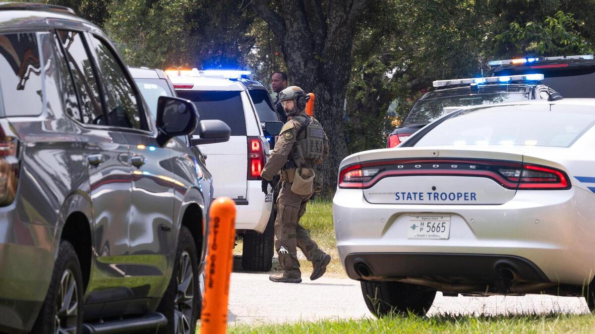 Law enforcement shuts down Greystone Boulevard on Tuesday, July 18, 2023. Occupants of nearby hotels were evacuated while police look for people shooting guns near the Embassy Suites.