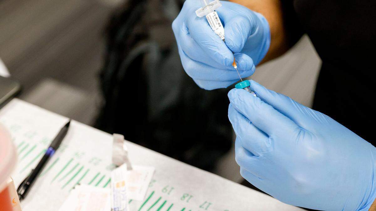 A nurse prepares a dose of the measles, mumps and rubella virus vaccine at a pop-up clinic at the Carrollton-Farmers Branch ISD Administration Building in Carrollton, Texas, on Friday, March 7, 2025. (Liz Rymarev/The Dallas Morning News/TNS)