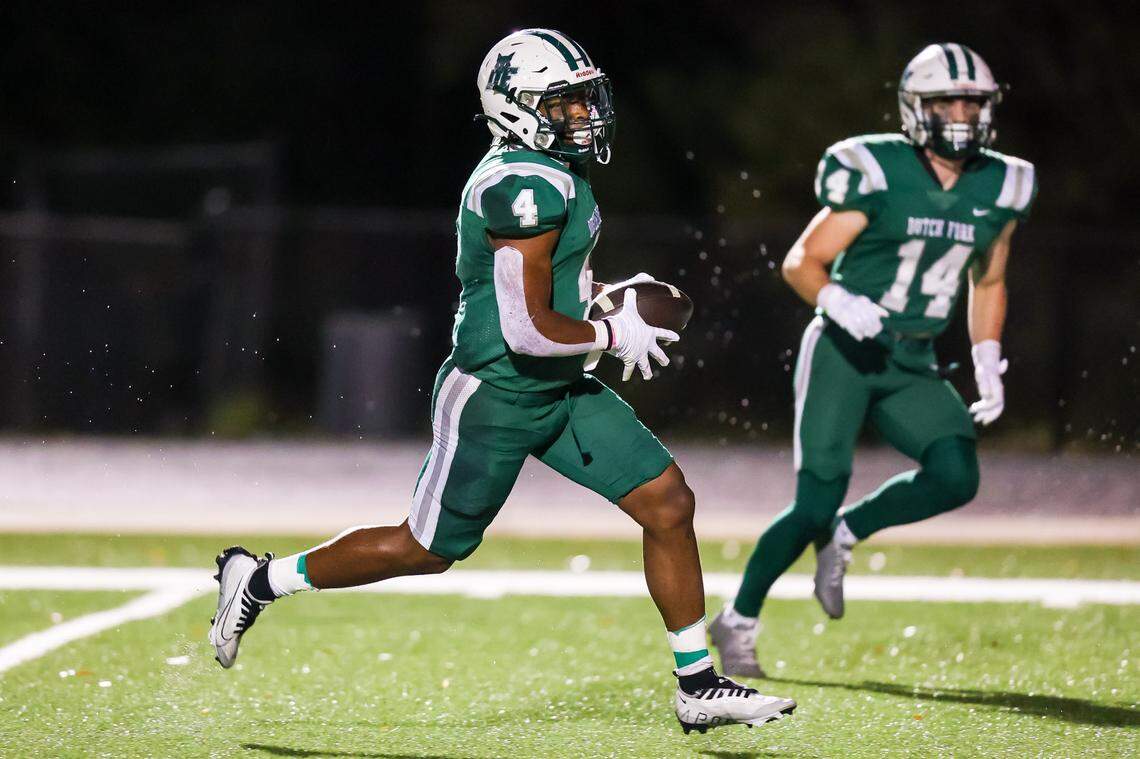 Dutch Fork Silver Foxes running back Jarvis Green (4) rushes for a touchdown against the Dorman Cavaliers during their game at Dutch Fork High School during round two of the playoffs Friday, Nov. 11, 2022.
