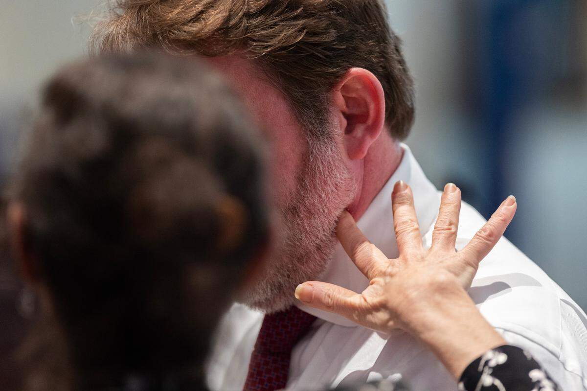 Dr. Ellen Riemer, forensic pathologist, demonstrates on defense attorney Phillip Barber where she determines a gunshot injured Paul Murdaugh during Alex Murdaugh’s trial for murder at the Colleton County Courthouse on Tuesday, Feb. 14, 2023. Joshua Boucher/The State/Pool