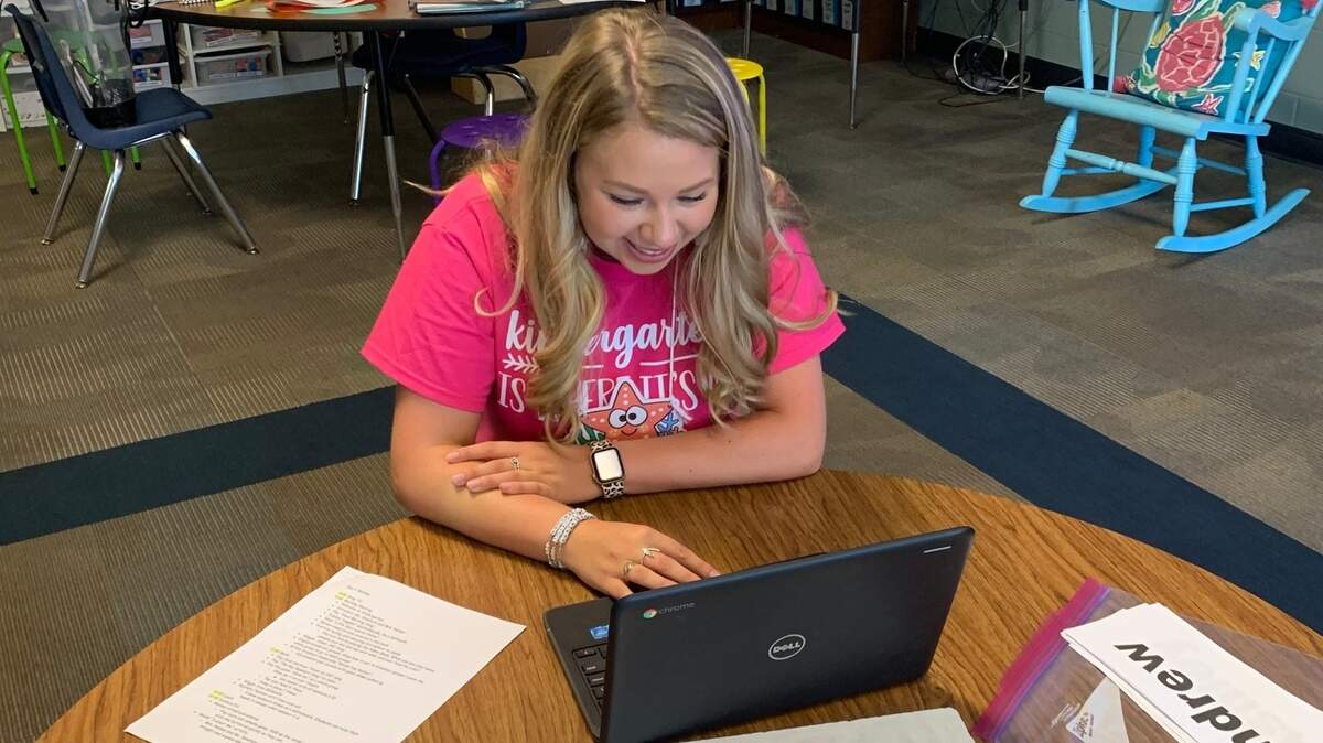 Round Top Elementary School kindergarten teacher Meghan Sonatore interacts with her students on the first day of school.