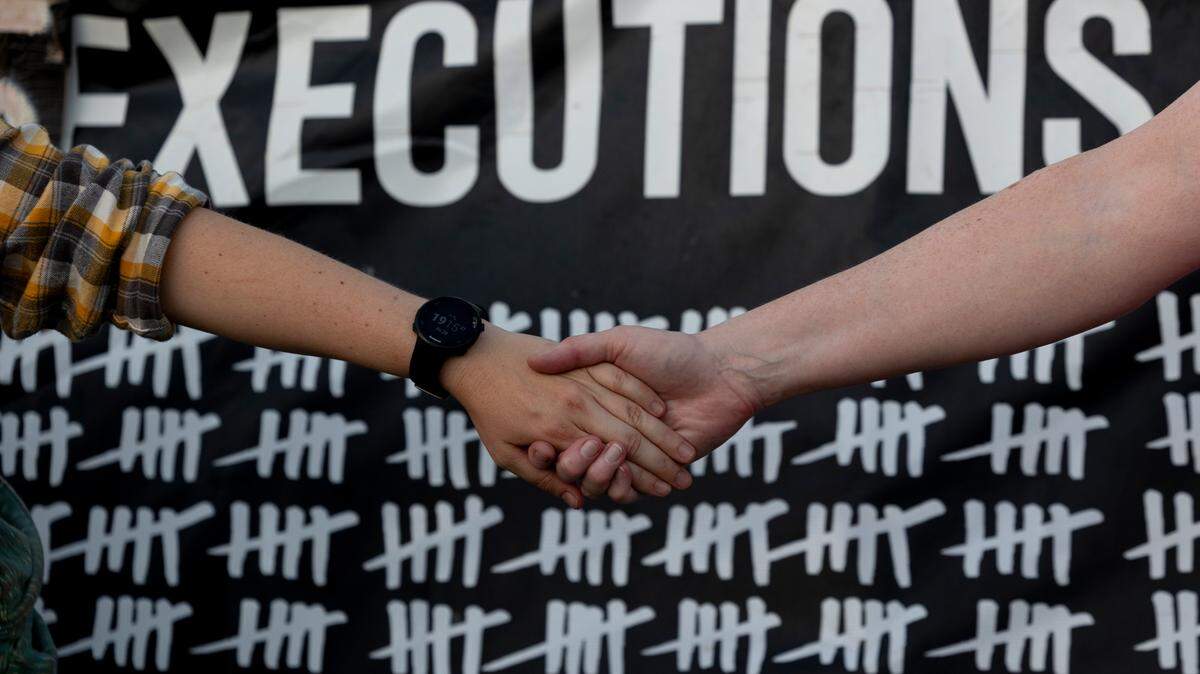 People advocate to stop the scheduled execution of Freddie Owens during a protest outside Broad River Correctional Institution on Friday, Sept. 20, 2024. The event was organized by South Carolinians for Alternatives to the Death Penalty.