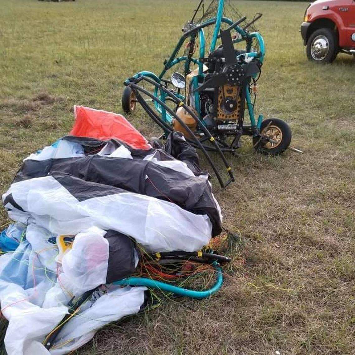 A man flying a motorized paraglider was hospitalized after crashing, the fire department said.