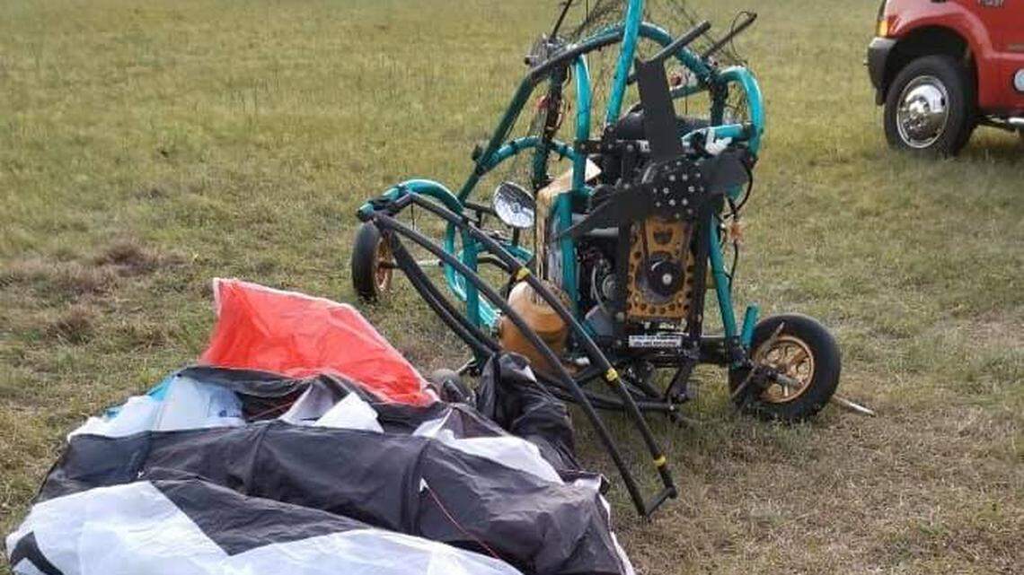 A man flying a motorized paraglider was hospitalized after crashing, the fire department said.