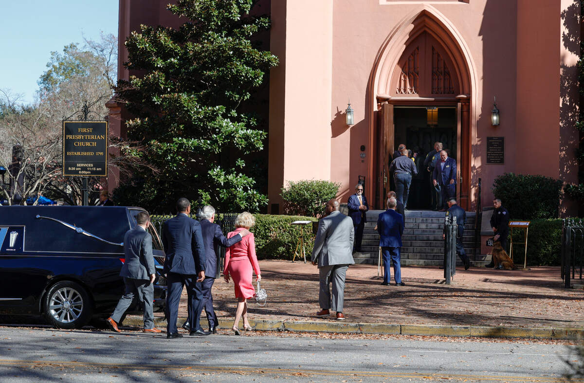 South Carolina Governor Henry McMaster and First Lady Peggy McMaster arrive at First Presbyterian Church in downtown Columbia or the funeral Joe E. Taylor on Thursday, Jan. 5, 2023.