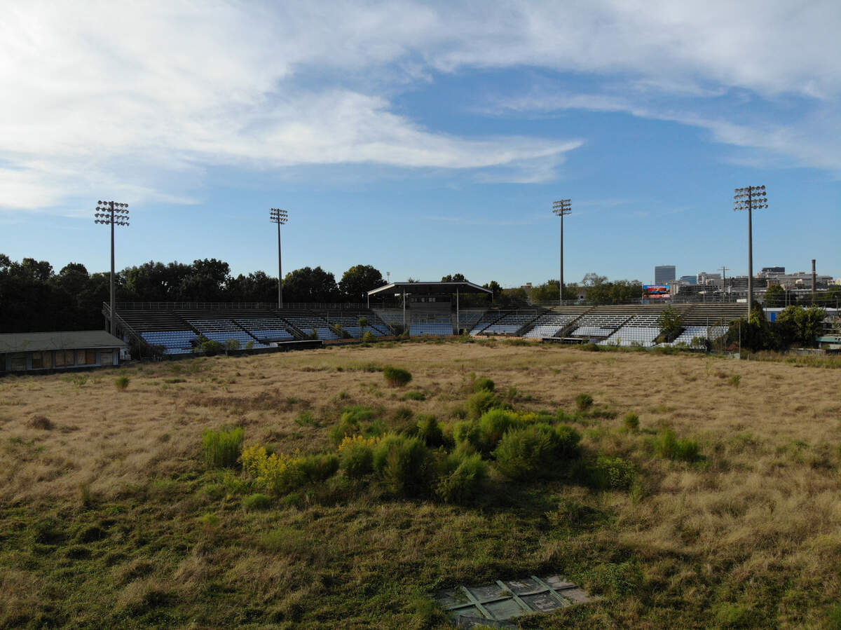 Capital City Stadium is overgrown and unused in Columbia, South Carolina on Tuesday, Sept. 28, 2022. The city and developers have tried to tear down the old baseball stadium for years.