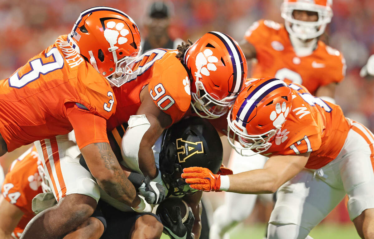 Clemson’s defense takes down Appalachian State during first-half action in Clemson, S.C. on Saturday, Sept. 7, 2024.