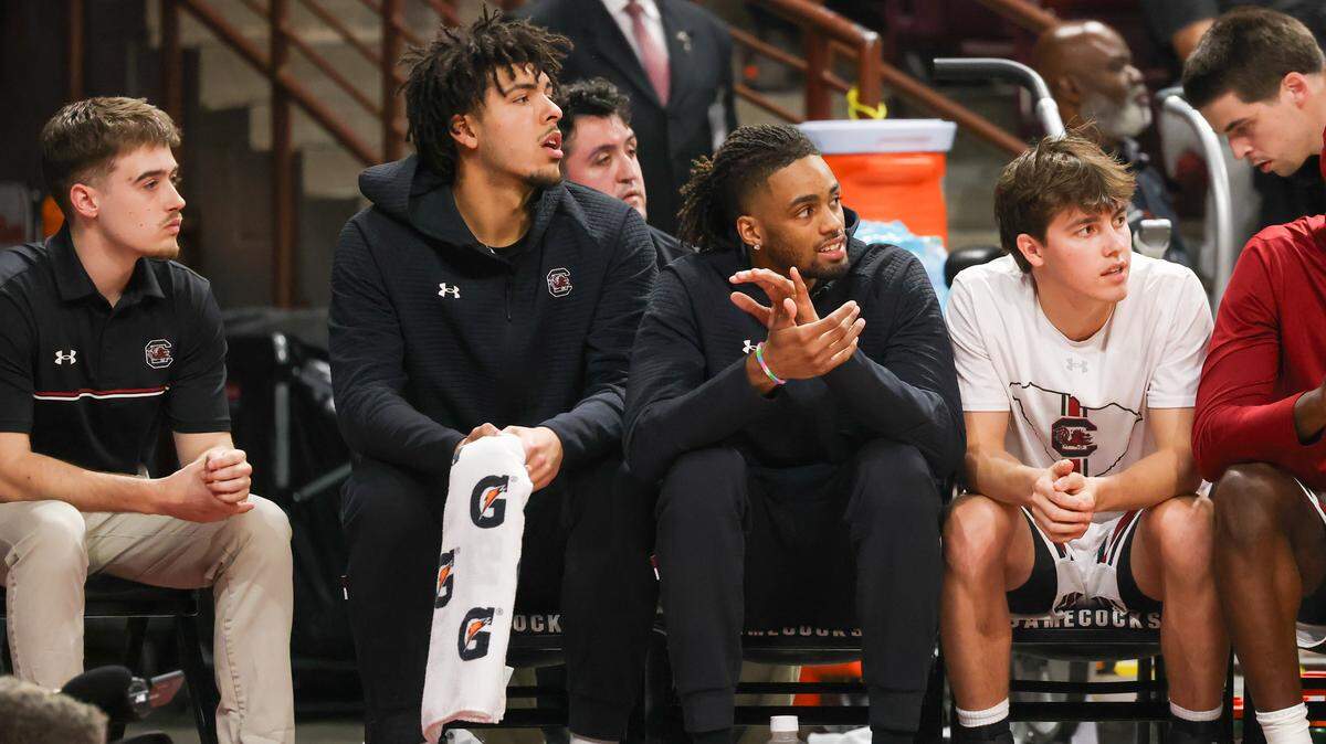 South Carolina forward EJ Walker (left) and guard Cam Scott (right) look on from the bench during the first half of action of the men's basketball game against North Carolina A&T at Colonial Life Arena on Tuesday, Nov. 4, 2025.


