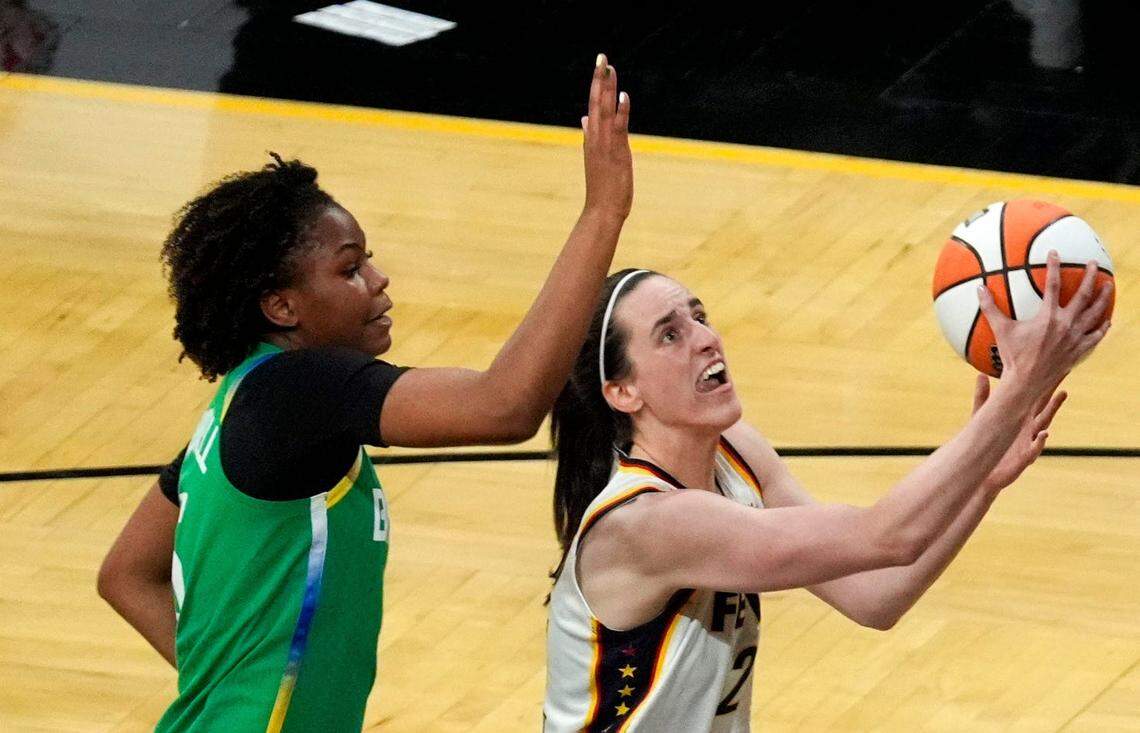 Indiana Fever guard Caitlin Clark (22) shoots against BrazilÕs Ayla McDowell (5) during an WNBA game May 4, 2025 at Carver-Hawkeye Arena in Iowa City, Iowa.