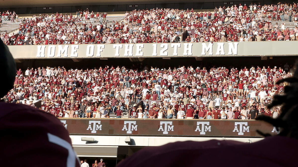 COLLEGE STATION, TEXAS - SEPTEMBER 27: Players of the Texas A&M Aggies acknowledge the fans following the game against the Auburn Tigers at Kyle Field on September 27, 2025 in College Station, Texas.