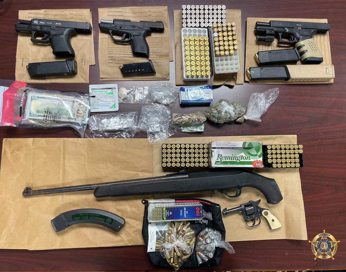 Guns and more were seized following a death.