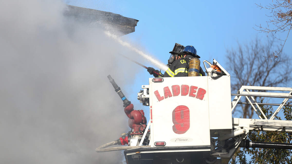 File photo: Columbia firefighters work to extinguish a house fire in January 2018.