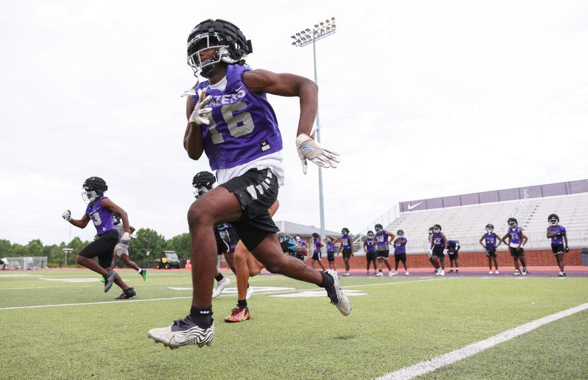 Players run drills during the first day of practice at Ridge View High School in Columbia on Friday, July 28, 2023.