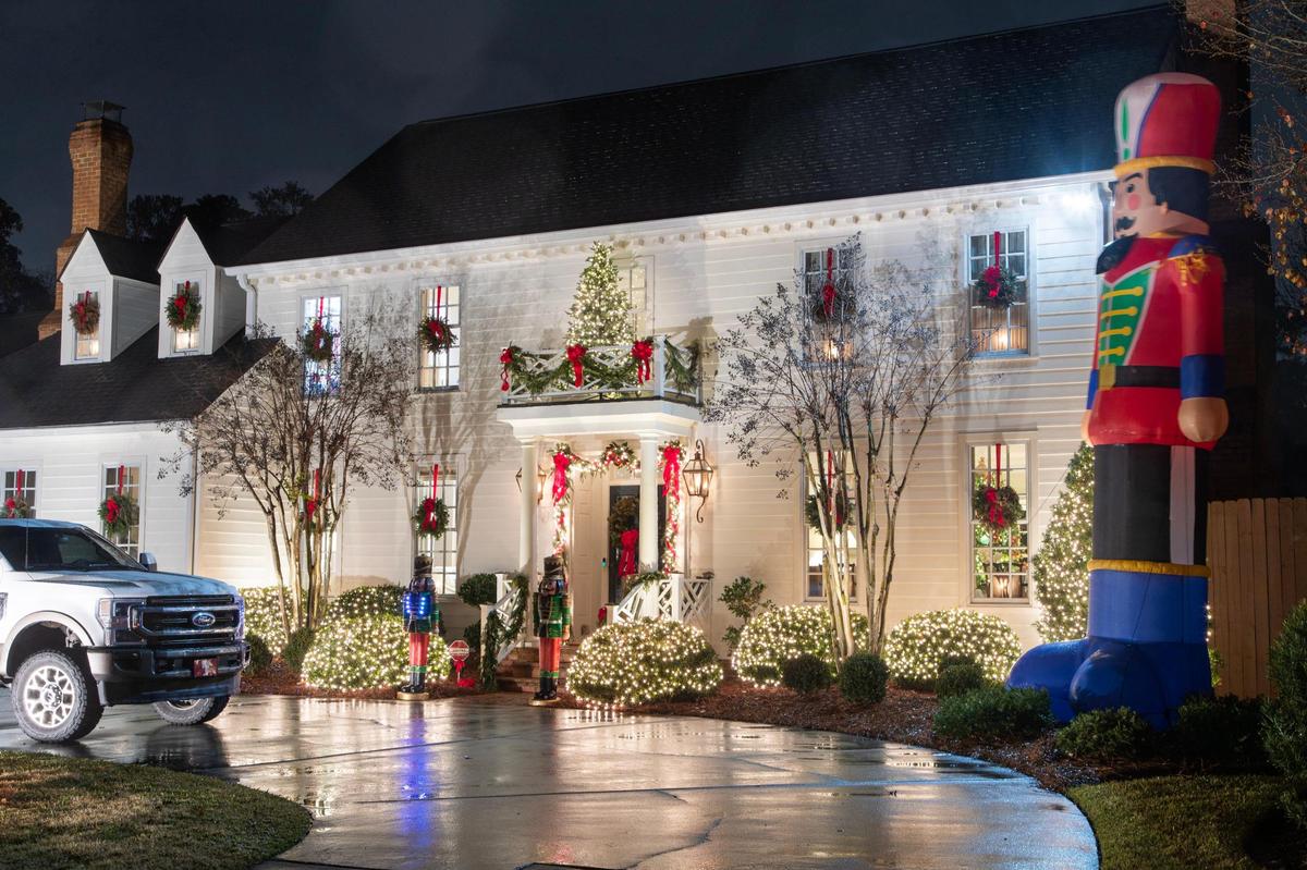 Christmas lights festoon a home in Forest Acres on Wednesday, December 21, 2022.