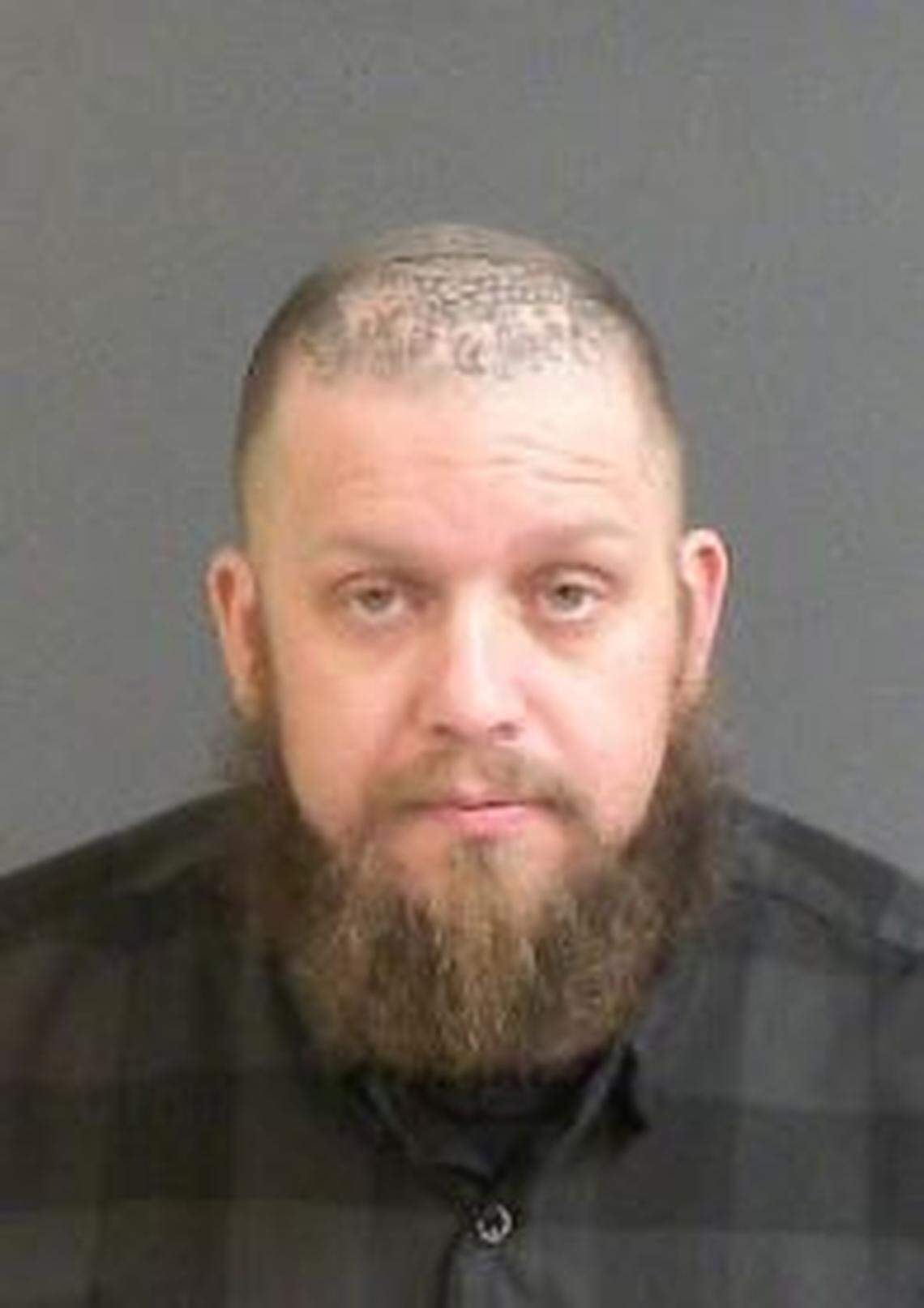 Mark Dwayne Walton was charged with accessory after the fact of murder.