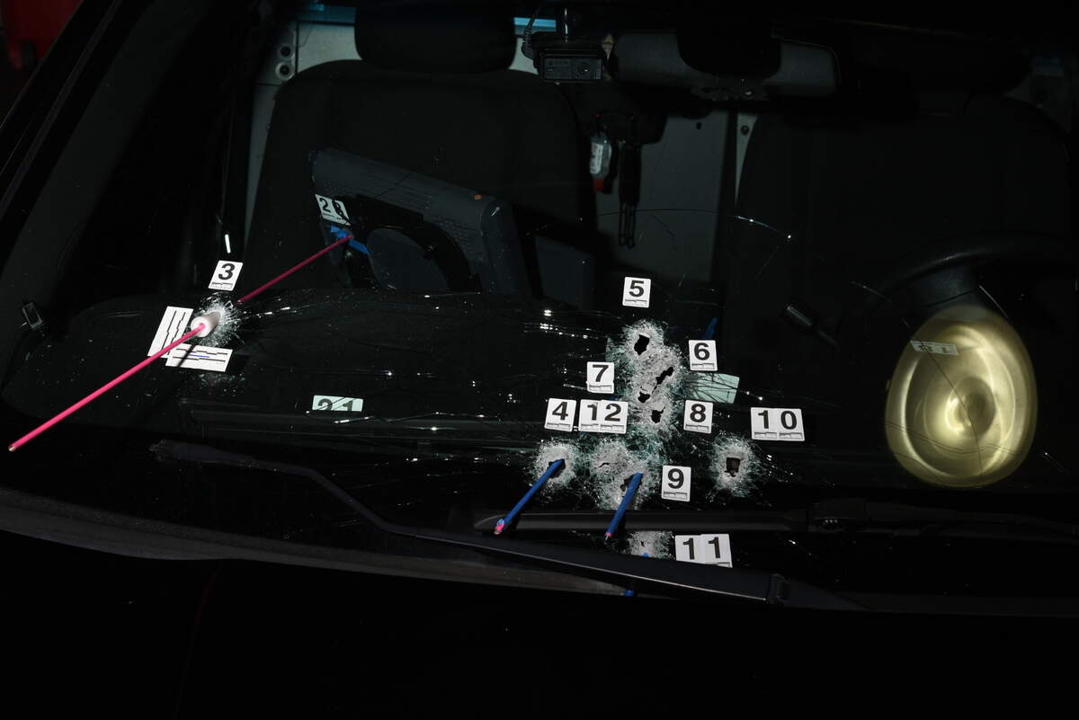 Bullet holes puncture the windshield of Richland County Sheriff Deputy Josiah McCombs’ cruiser, where it was shot by Michael Jayvone Dennis and where McCombs returned fire through the glass.