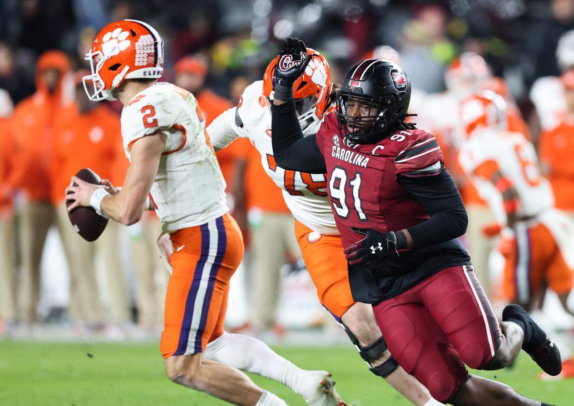 South Carolina defensive tackle Tonka Hemingway (91) chases down Clemson quarterback Cade Klubnik (2) during the first half of South Carolina’s game against Clemson at Williams-Brice Stadium in Columbia on Saturday, November 25, 2023.