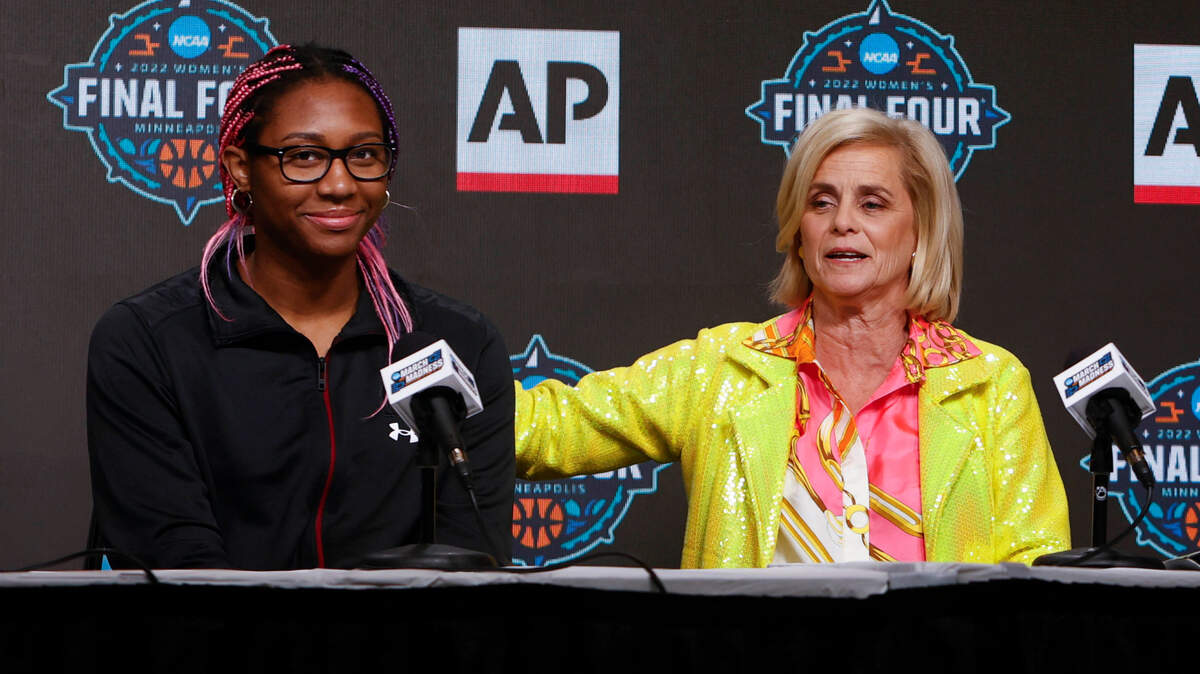 LSU head coach Kim Mulkey congratulates South Carolina’s Aliyah Boston during the presentation of the AP Coach and AP player of the year awards during a press conference at the Final Four at the Target Center in Minneapolis, Min. on Thursday, March 31, 2022.