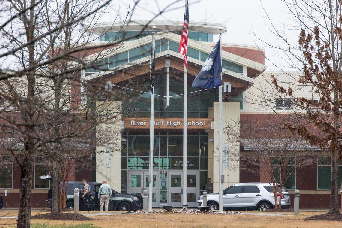 Police officers outside River Bluff High School after students were sent home due to a threat to the school and several others in the area Thursday, Feb. 2, 2023.