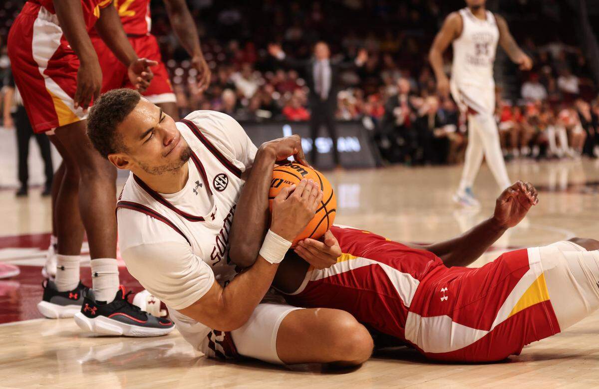 South Carolina forward Benjamin Bosmans-Verdonk (31) gets tangles up with Virginia Military guard Taeshaud Jackson II (2) while battling for a rebound during the second half of the Gamecocks’ game against the visiting Keydets at Colonial Life Arena on Monday, November 13, 2023.