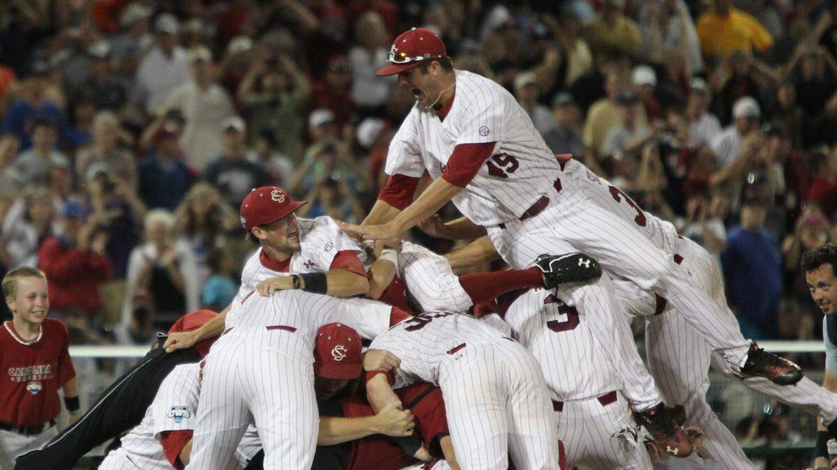 South Carolina Gamecocks players celebrate after the final out in game two of the 2011 College World Series best-of-three final series against Florida at TD Ameritrade Park in Omaha, NE, Tuesday, June 28, 2011. South Carolina won their second NCAA baseball title by beating the Gators 5-2.