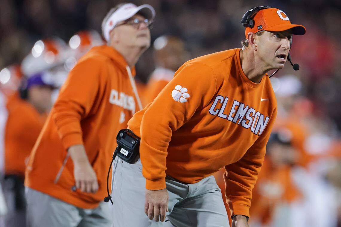 Head coach Dabo Swinney of the Clemson Tigers watches a field goal attempt during the first half of the NCAA football game between the Louisville Cardinals and the Clemson Tigers at L&N Federal Credit Union Stadium on November 14, 2025 in Louisville, Kentucky.