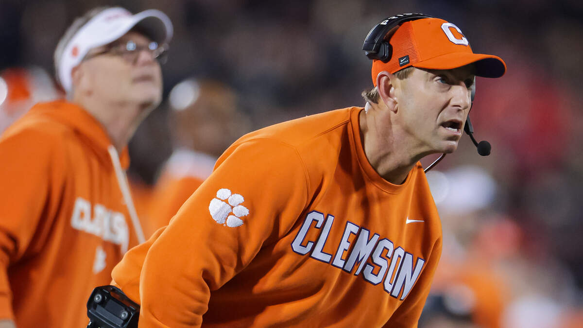Clemson football coach Dabo Swinney (right) has publicly said his program hasn’t done a good job of recruiting and evaluating players. Will he go to the transfer portal to supplement his misses?