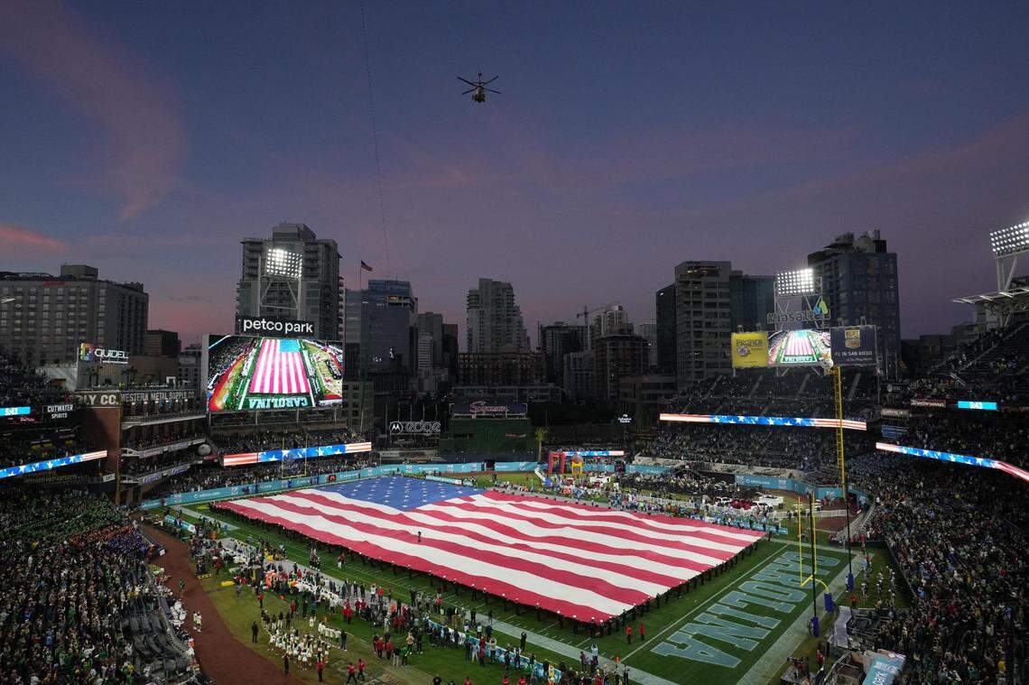 Dec 28, 2022; San Diego, CA, USA; A general overall view of a United States flag on the field and helicopter flyover during the playing of the national anthem at the 2022 Holiday Bowl between the Oregon Ducks and the North Carolina Tar Heels at Petco Park. Mandatory Credit: Kirby Lee-USA TODAY Sports