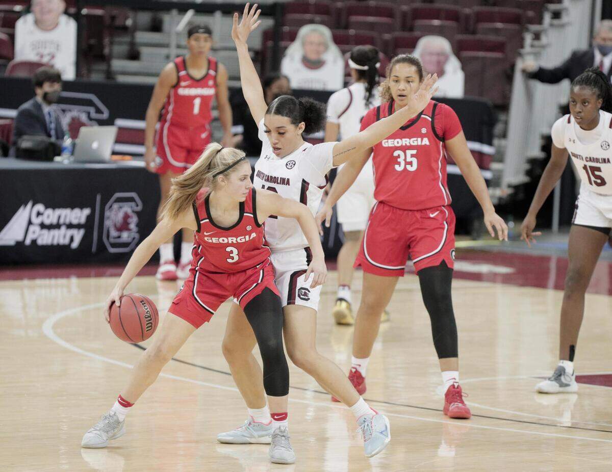 Georgia Lady Bulldogs guard Sarah Ashlee Barker (3) tries to pass as South Carolina Gamecocks guard Brea Beal (12) at Colonial Life Arena on Thursday, January 21, 2021.
