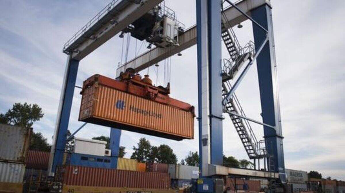 A shipping container is place on a train at the South Carolina Inland Port in Greer on Monday, September 25, 2017.
