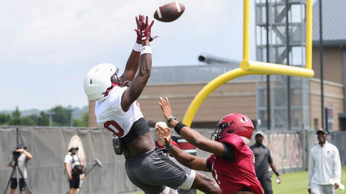 South Carolina tight end Michael Smith (20) pulls down a pass while being defended by defensive back Nick Emmanwori (7) during practice in Columbia on Sunday, August 11, 2024.