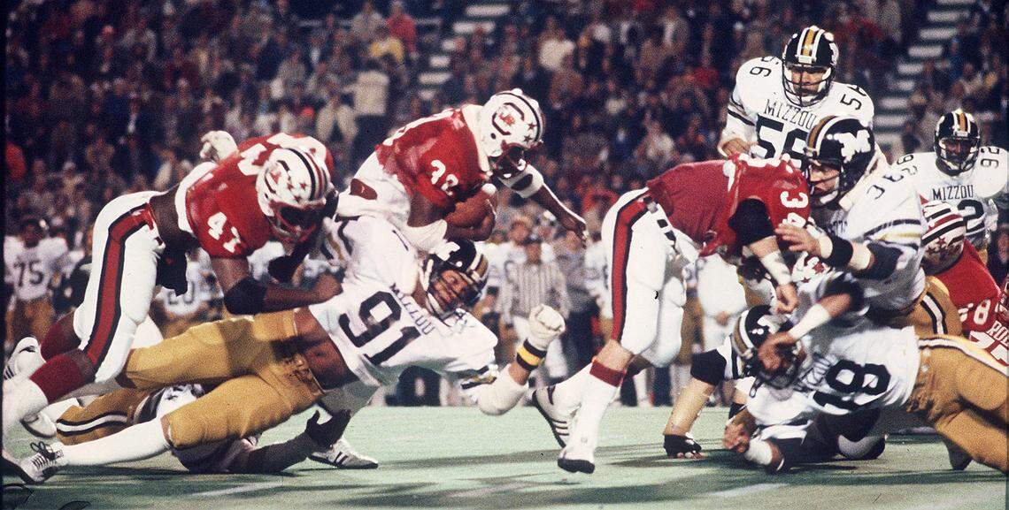 South Carolina’s George Rogers (38) runs with the ball during the Hall of Fame Bowl in 1979. South Carolina played Missouri.