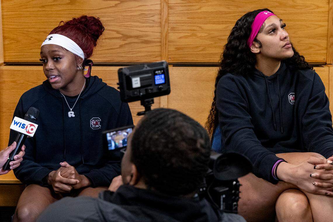 South Carolina’s Raven Johnson, left, and Kamilla Cardoso are interviewed by members of the media during an open locker room event in advance of the Elite Eight game against Oregon State at the NCAA Tournament at the MVP Arena in Albany, NY on Saturday, March 30, 2024.