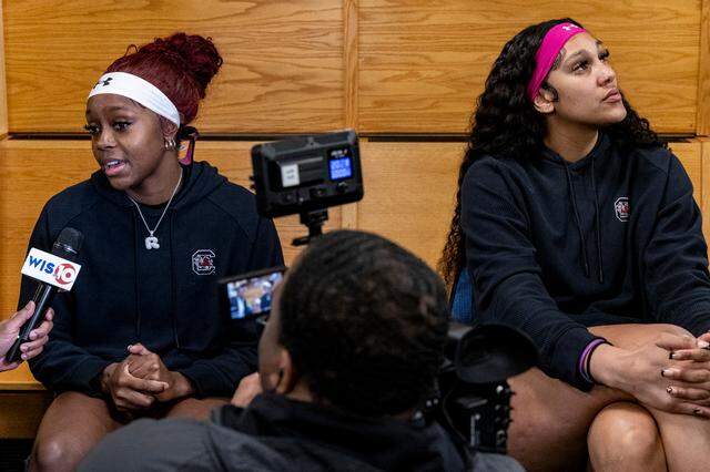 South Carolina’s Raven Johnson, left, and Kamilla Cardoso are interviewed by members of the media during an open locker room event in advance of the Elite Eight game against Oregon State at the NCAA Tournament at the MVP Arena in Albany, NY on Saturday, March 30, 2024.