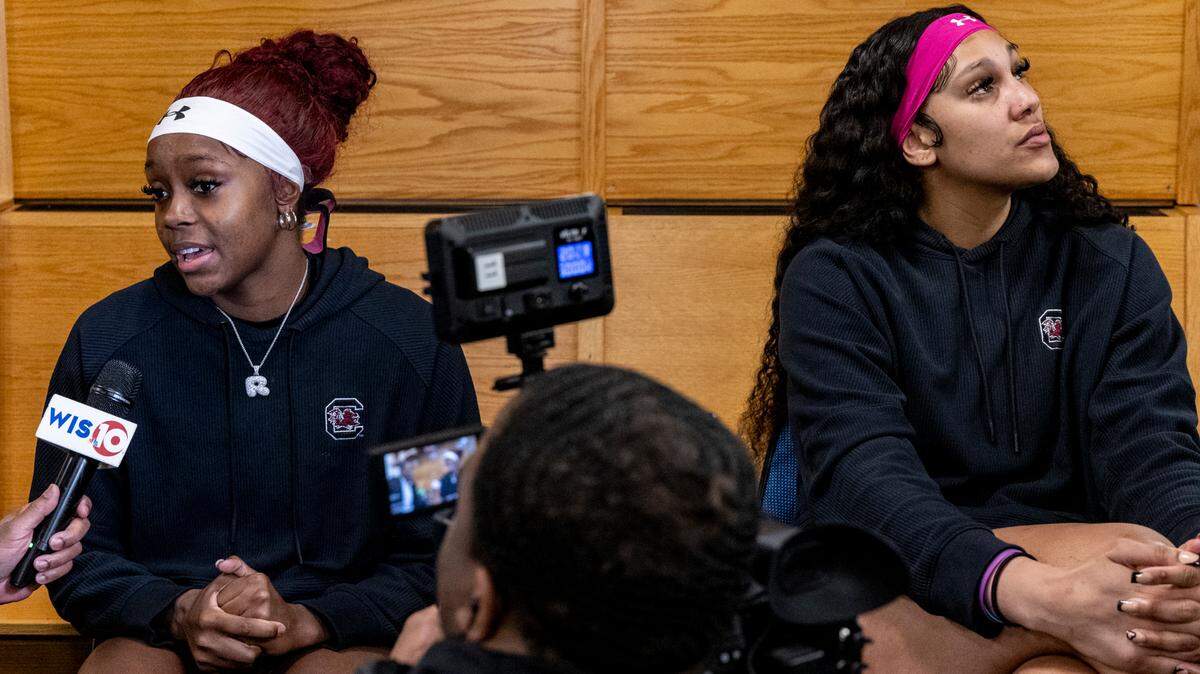 South Carolina’s Raven Johnson, left, and Kamilla Cardoso are interviewed by members of the media during an open locker room event in advance of the Elite Eight game against Oregon State at the NCAA Tournament at the MVP Arena in Albany, NY on Saturday, March 30, 2024.