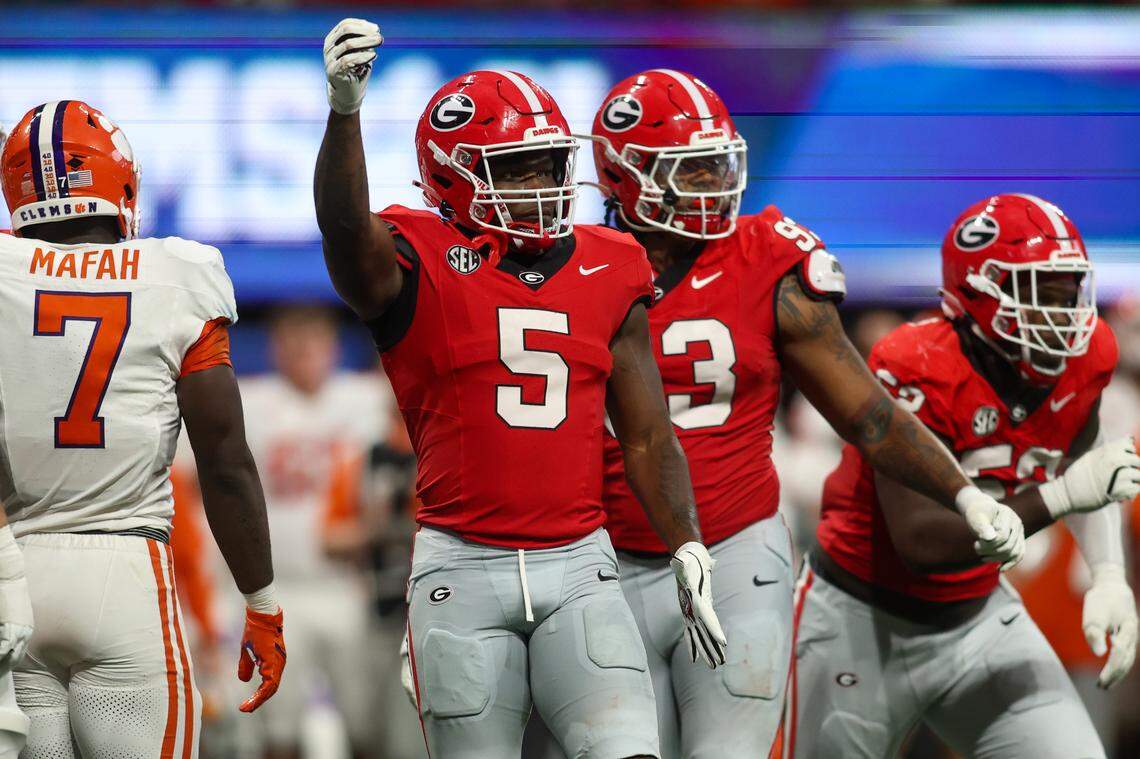 Aug 31, 2024; Atlanta, Georgia, USA; Georgia Bulldogs linebacker Raylen Wilson (5) reacts after a tackle against the Clemson Tigers in the third quarter at Mercedes-Benz Stadium.