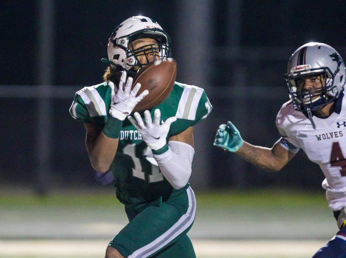 Dutch Fork Silver Foxes Elijah Spencer (11) makes a touchdown reception against the White Knoll Timberwolves.