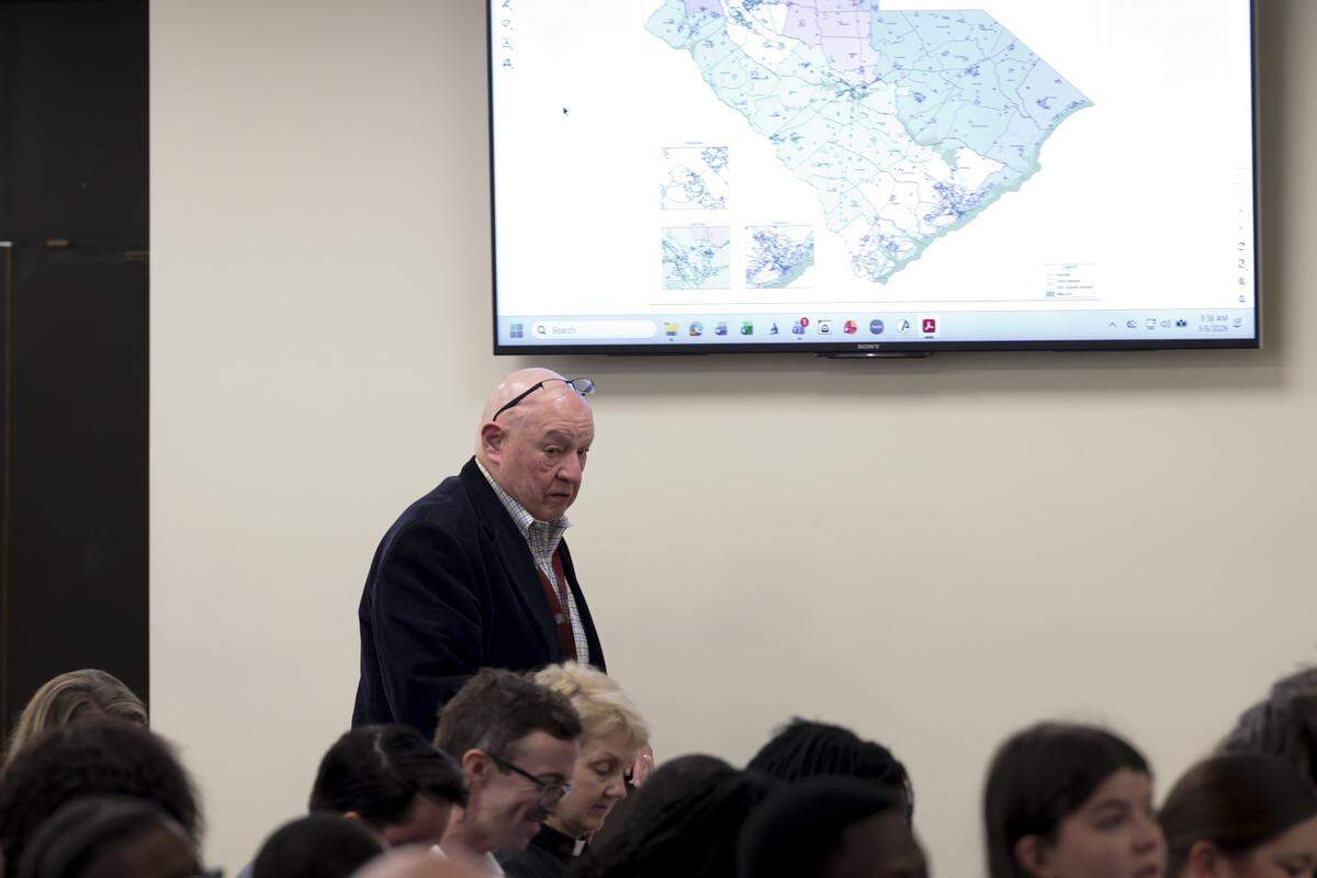 State Election Commission executive director Conway Belangia prepares to address the constitutional laws committee about a proposed redistricting map on Friday, May 8, 2026.
