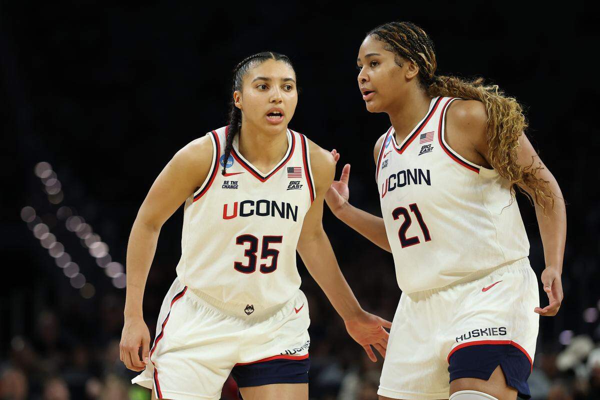 FORT WORTH, TEXAS - MARCH 29: Azzi Fudd #35 and Sarah Strong #21 of the UConn Huskies reacts against the Notre Dame Fighting Irish during the fourth quarter in the Elite Eight of the 2026 NCAA Women's Basketball Tournament at Dickies Arena on March 29, 2026 in Fort Worth, Texas. (Photo by Elsa/Getty Images)