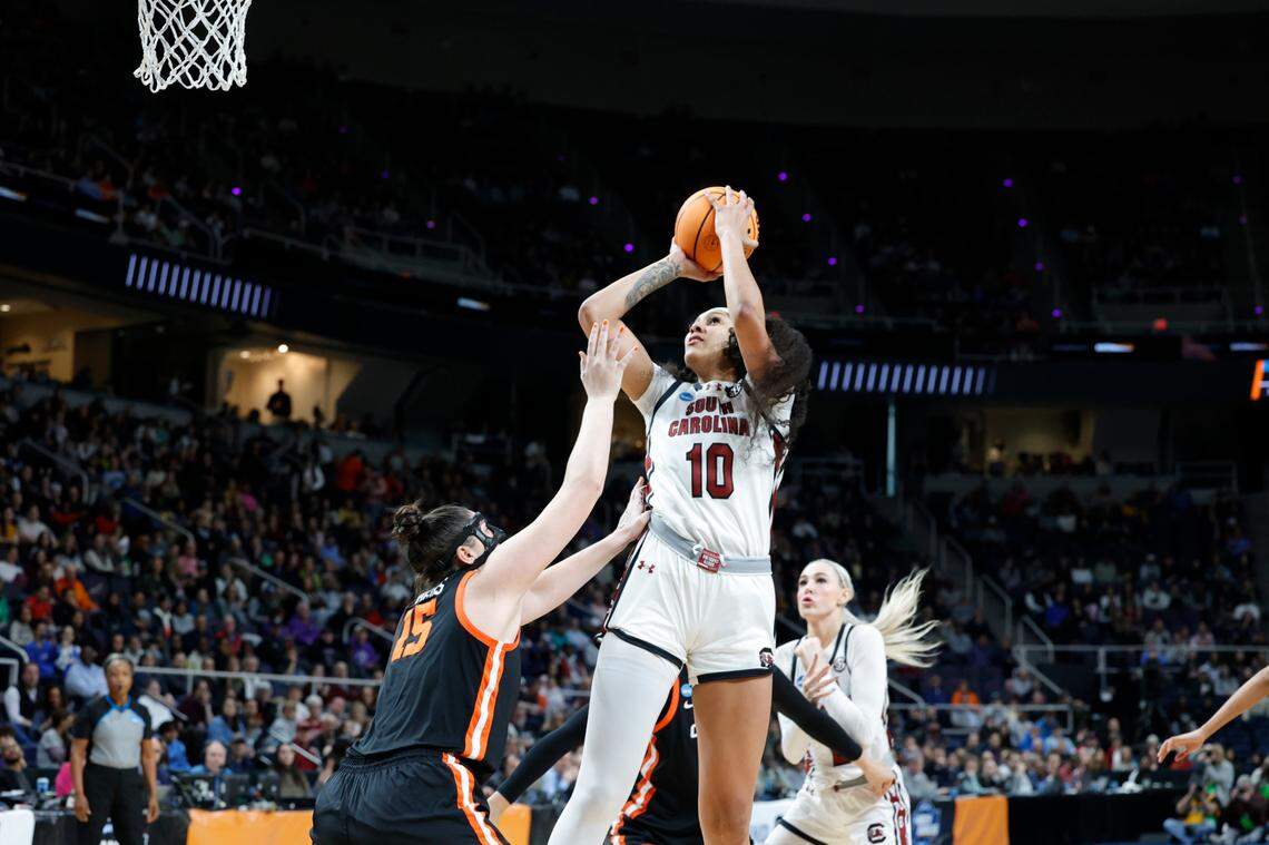 South Carolina’s Kamilla Cardoso (10) shoots as Oregon State’s Raegan Beers (15) pressures during the Elite Eight round of the NCAA Tournament at the MVP Arena in Albany, New York on Sunday, March 31, 2024.