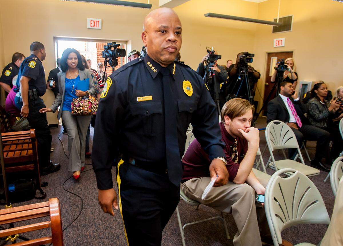Columbia Police Chief Randy Scott enters a press conference to announce his resignation Monday. Scott suffered from PTSD after a deputy he hired while he worked at the Richland County Sheriff’s Department was killed in 2005.