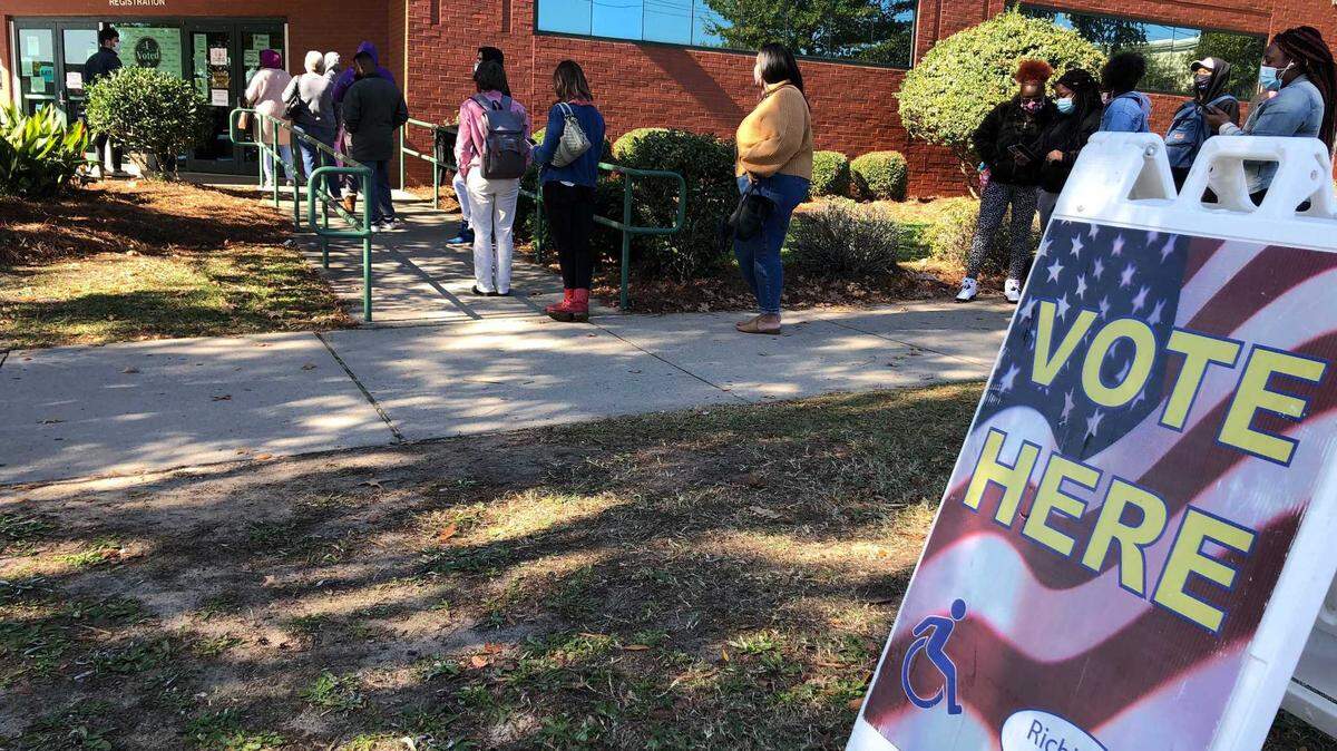 South Carolina voters line up Monday, Nov. 2, 2020, outside the Richland County Elections and Voter Registration Office on the state’s final day to vote absentee in person.