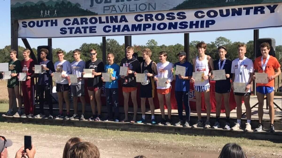 Class 5A boys all-state cross country runners pose for a photo Saturday at the SC High School League state meet at Sandhills Resarch Center on Nov. 3