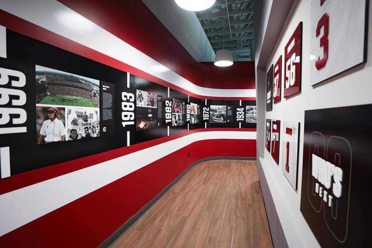 A wall showing Gamecock football history and of retired jerseys is displayed at the new preview center for luxury seating planned at Williams-Brice Stadium. The University of South Carolina has designed a preview center in the Bignon Gameday Center, adjacent to the stadium.