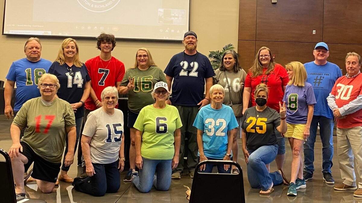 A group of parents and teachers from Lexington-Richland 5 wore shirts in solidarity to protest Ken Loveless’ Facebook subpoenas.