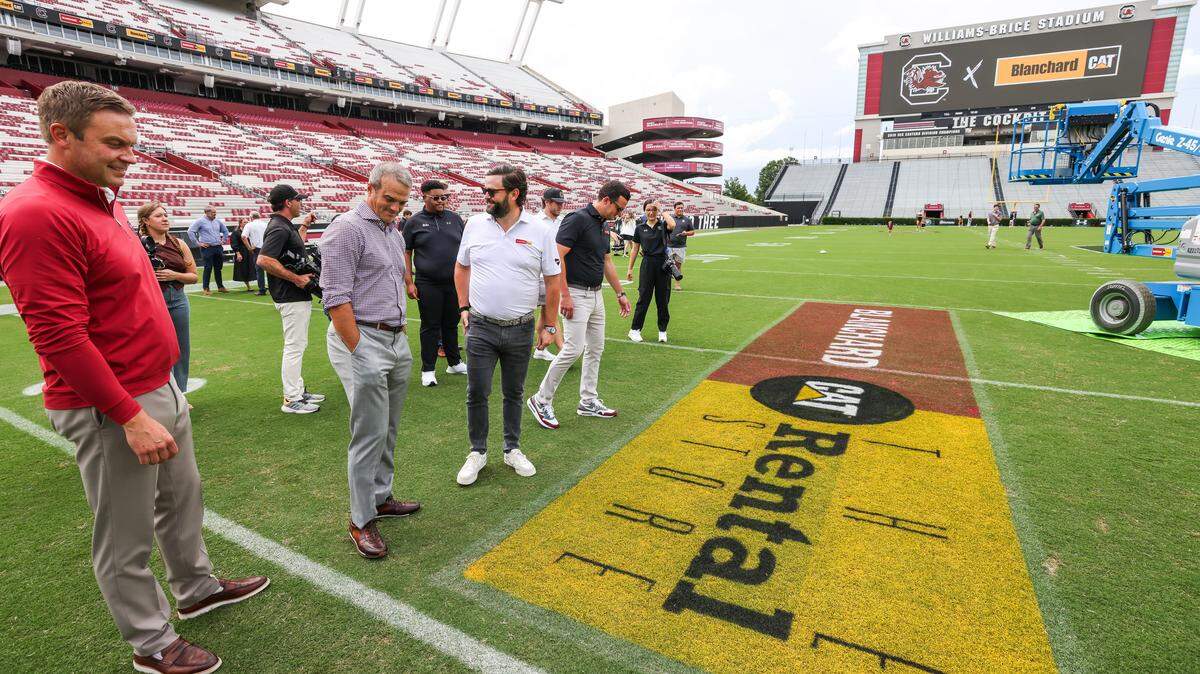 South Carolina athletic director Jeremiah Donati, head coach Shane Beamer, Rozier Blanchard and Boyd Blanchard are seen on the field following a press conference announcing a partnership with Blanchard CAT at Williams-Brice Stadium in Columbia on Monday, August 11, 2025.


