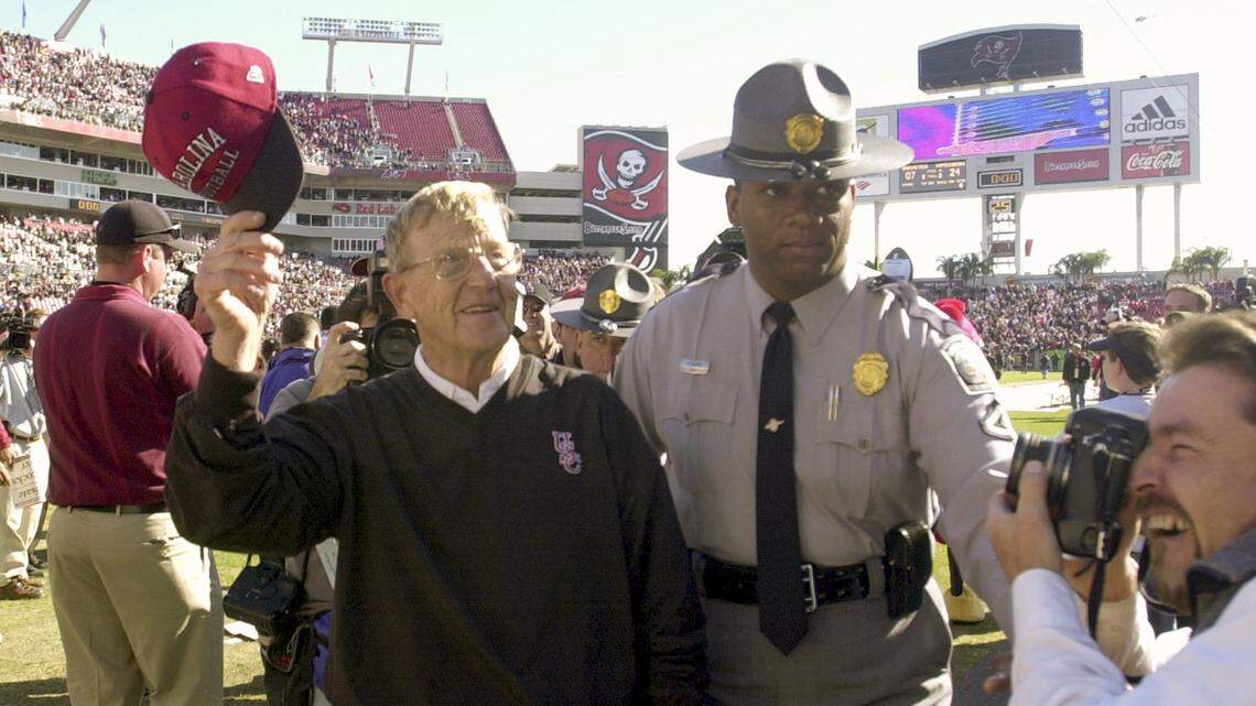 1/01/2001 - USC coach Lou Holtz waves to the crowd after coaching his gamecocks to a victory in the 2001 Outback Bowl at Raymond James Stadium in Tampa, Fla. on New Years Day. USC beat Ohio State 24-7. Jason Clark/The State