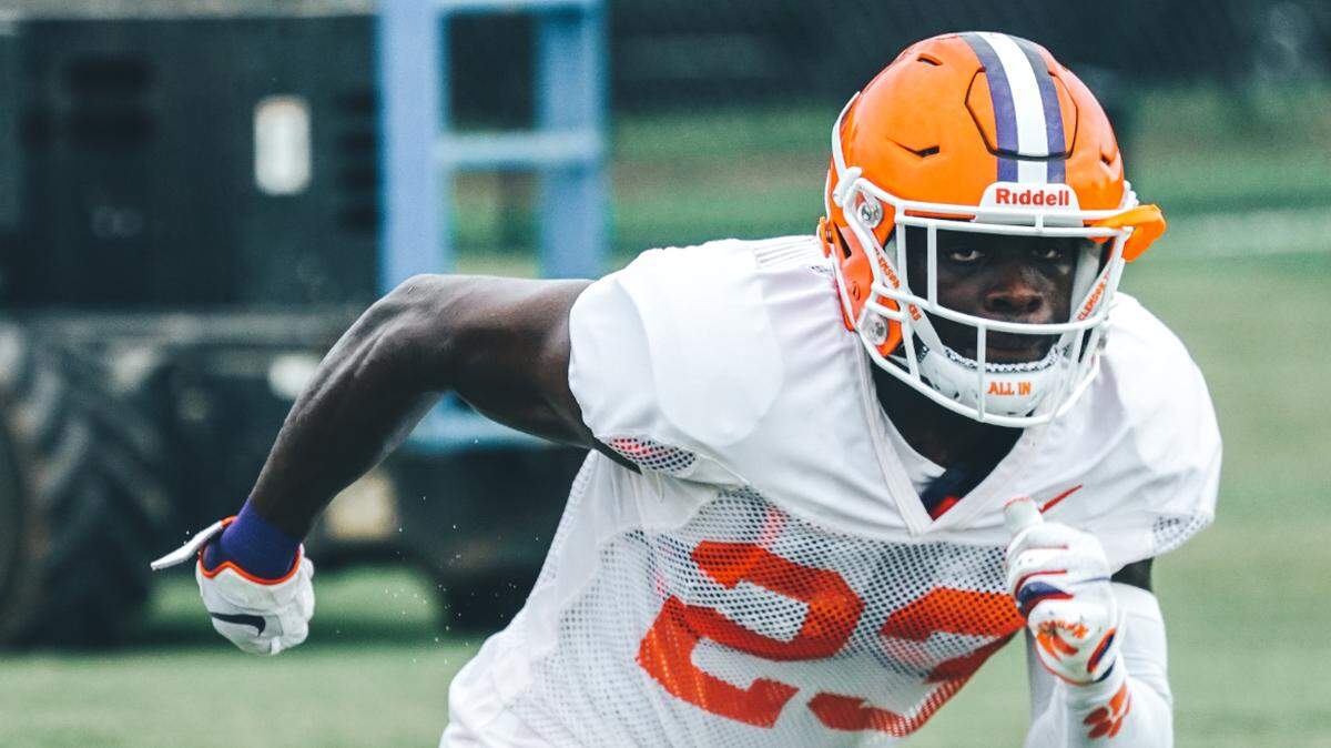 Clemson junior cornerback Andrew Booth said he started practicing yoga during the offseason, completing the exercises outside in the heat.