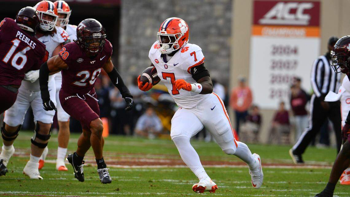 Clemson Tigers running back Phil Mafah (7) runs the ball against the Virginia Tech Hokies during the first quarter at Lane Stadium.